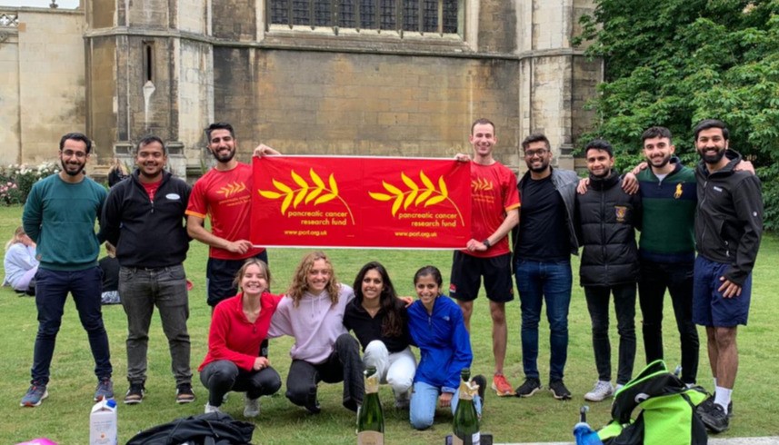 Monty and Tahir with friends at the finish line