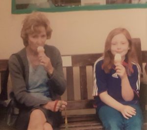 Josie Bennett as a child with her grandma, Pat Bennett, both eating ice cream